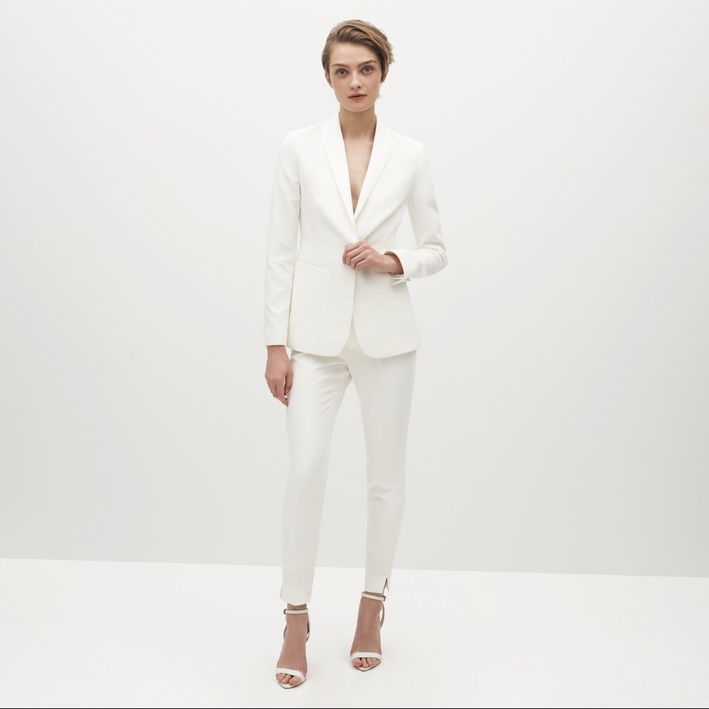 Brand new never worn white women’s suit.